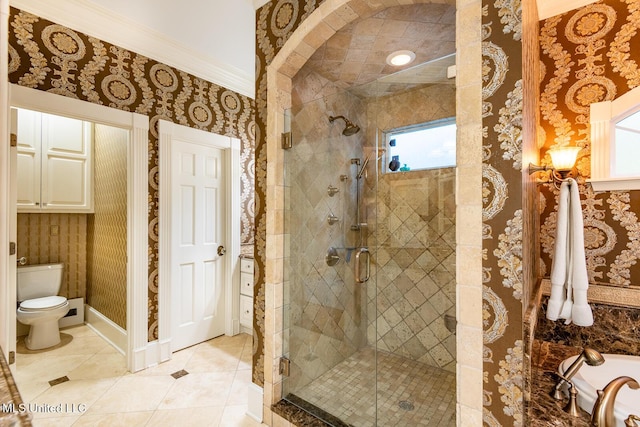 102 Melrose Montebello Pkwy, Natchez, MS 39120 - full bath featuring crown molding, a stall shower, tile patterned floors, wallpapered walls, and a tub to relax in