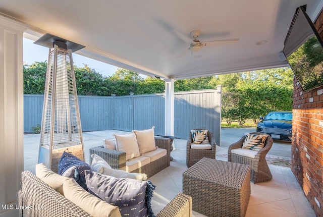 102 Melrose Montebello Pkwy, Natchez, MS 39120 - fenced backyard featuring an outdoor hangout area, a ceiling fan, and a patio