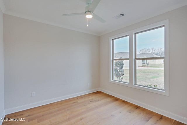 unfurnished room featuring light hardwood / wood-style flooring and ceiling fan