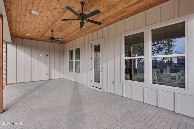 view of patio / terrace featuring ceiling fan