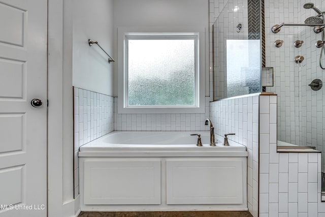 625 Wild Horse Ln, Brandon, MS 39042 - full bath with a garden tub, tiled shower, and tile walls
