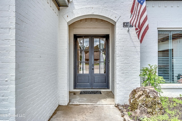 625 Wild Horse Ln, Brandon, MS 39042 - doorway to property with french doors and brick siding