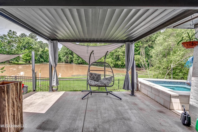 625 Wild Horse Ln, Brandon, MS 39042 - view of patio / terrace featuring an outdoor hot tub and a water view