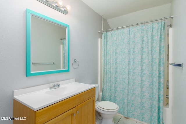 full bathroom with shower / bath combo with shower curtain, toilet, vanity, and tile patterned flooring