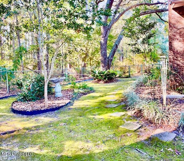 view of yard with fence