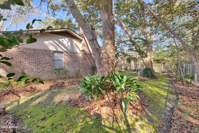 view of yard with fence