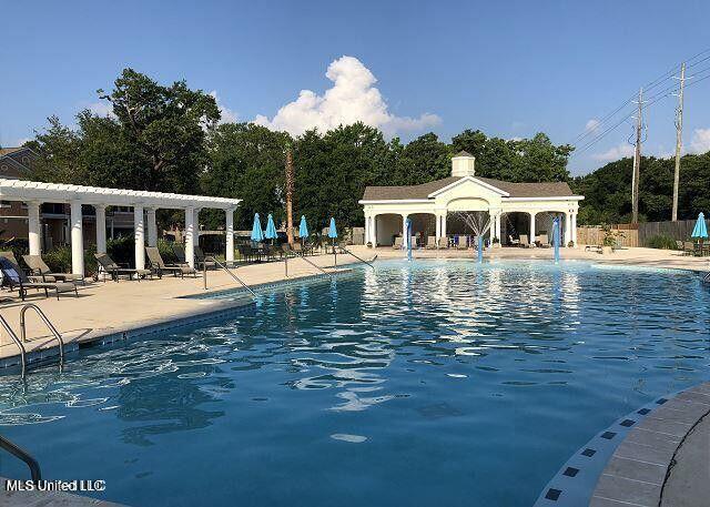 2252 Beach Dr Unit 1704, Gulfport, MS 39501 - community pool featuring a patio area