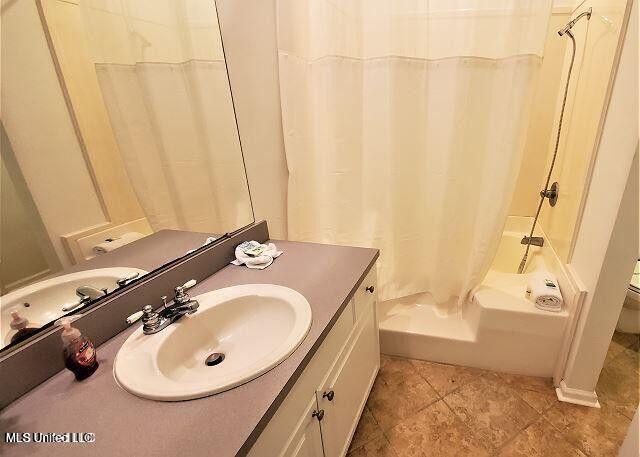 2252 Beach Dr Unit 1704, Gulfport, MS 39501 - bathroom with vanity, shower / bath combo, and tile patterned flooring