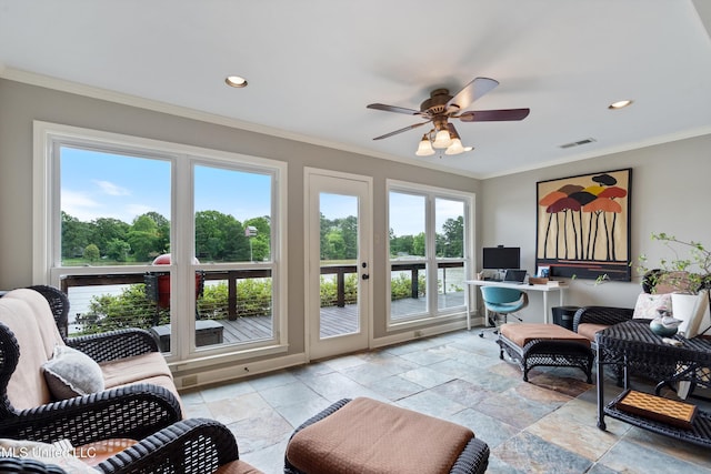 7300 W Shahkoka Dr, Olive Branch, MS 38654 - living room featuring a desk, a ceiling fan, stone tile floors, ornamental molding, and recessed lighting