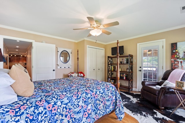 7300 W Shahkoka Dr, Olive Branch, MS 38654 - bedroom with access to outside, wood finished floors, crown molding, ceiling fan, and a closet