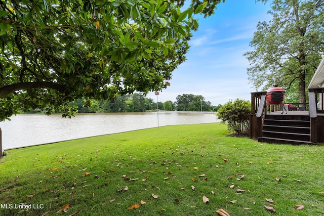 7300 W Shahkoka Dr, Olive Branch, MS 38654 - view of green lawn featuring a water view
