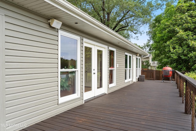 7300 W Shahkoka Dr, Olive Branch, MS 38654 - wooden terrace with french doors