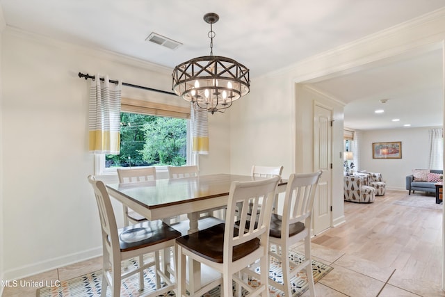 7300 W Shahkoka Dr, Olive Branch, MS 38654 - dining area with plenty of natural light, a chandelier, baseboards, ornamental molding, and light tile patterned flooring