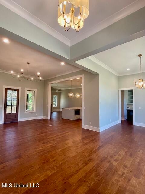 unfurnished living room with dark hardwood / wood-style floors, crown molding, and ceiling fan with notable chandelier