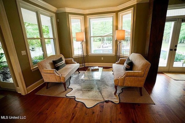 sunroom / solarium featuring french doors