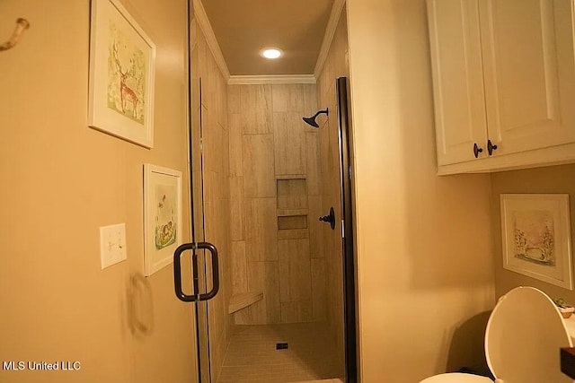 bathroom with a stall shower and toilet