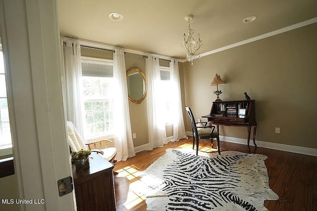 office area with recessed lighting, wood finished floors, baseboards, ornamental molding, and an inviting chandelier