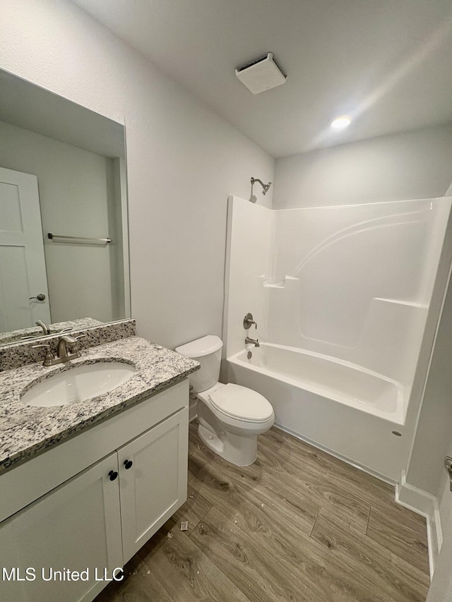 18059 Tiffany Renee Dr, Gulfport, MS 39503 - full bath featuring wood finished floors, toilet, bathtub / shower combination, and vanity
