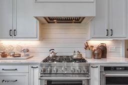 381 Parkinson Rd, Flora, MS 39071 - bar area featuring appliances with stainless steel finishes and extractor fan
