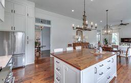 381 Parkinson Rd, Flora, MS 39071 - kitchen with freestanding refrigerator, butcher block countertops, dark wood-style floors, ceiling fan, and recessed lighting