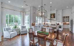 381 Parkinson Rd, Flora, MS 39071 - dining space with dark wood-style floors, recessed lighting, and a chandelier