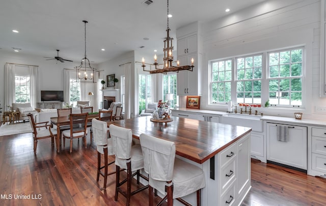 381 Parkinson Rd, Flora, MS 39071 - kitchen with a sink, open floor plan, a chandelier, dark wood finished floors, and recessed lighting
