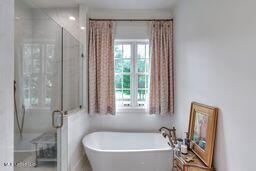 381 Parkinson Rd, Flora, MS 39071 - full bath with a freestanding tub and a stall shower