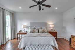 381 Parkinson Rd, Flora, MS 39071 - bedroom with wood finished floors, baseboards, recessed lighting, and ceiling fan