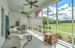 381 Parkinson Rd, Flora, MS 39071 - sunroom with ceiling fan