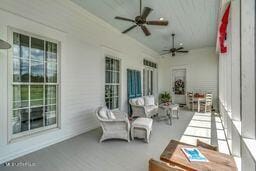381 Parkinson Rd, Flora, MS 39071 - view of patio / terrace featuring a ceiling fan and outdoor lounge area