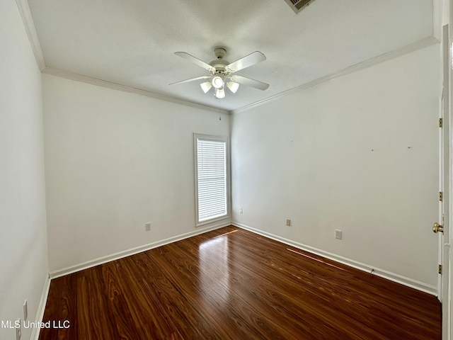 spare room with wood-type flooring, ceiling fan, and crown molding