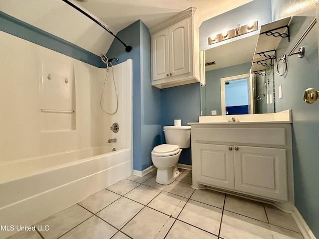 full bathroom featuring tile patterned flooring, vanity, shower / bath combination, and toilet