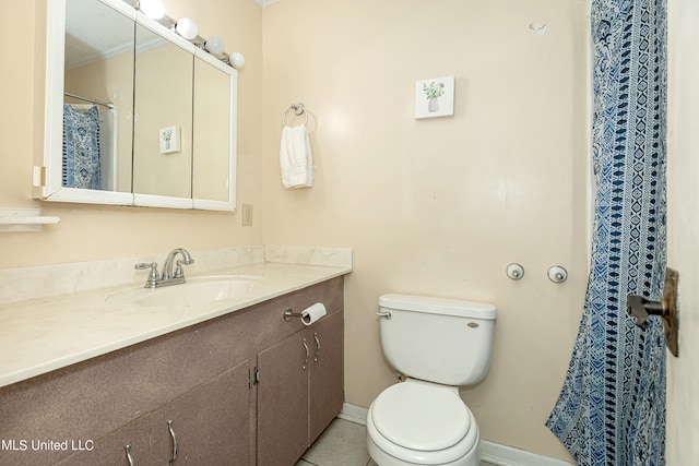 bathroom with vanity, a shower with shower curtain, toilet, and tile patterned floors