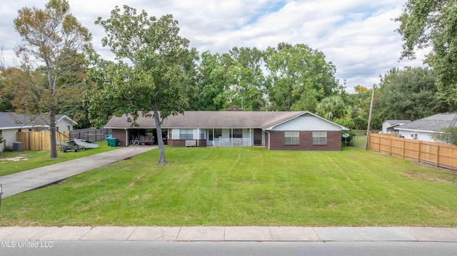 ranch-style house with a front yard