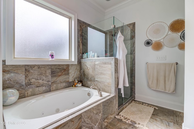 full bathroom featuring a jetted tub, a stall shower, baseboards, and crown molding