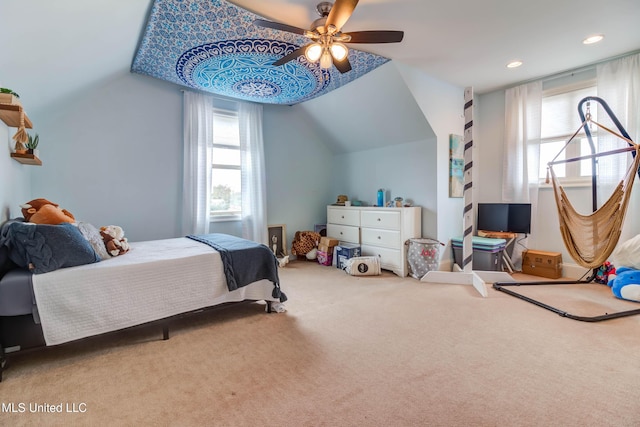 carpeted bedroom featuring lofted ceiling, a ceiling fan, and recessed lighting