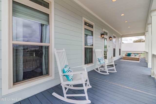 deck featuring a porch