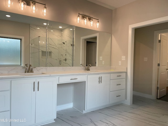 bathroom featuring vanity and a shower with shower door