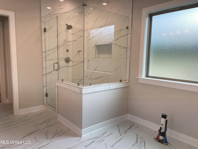 9092 Bennett Trl, Hernando, MS 38632 - full bath featuring marble look tile flooring and a marble finish shower