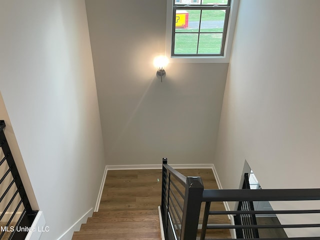 9092 Bennett Trl, Hernando, MS 38632 - stairway featuring wood finished floors and baseboards