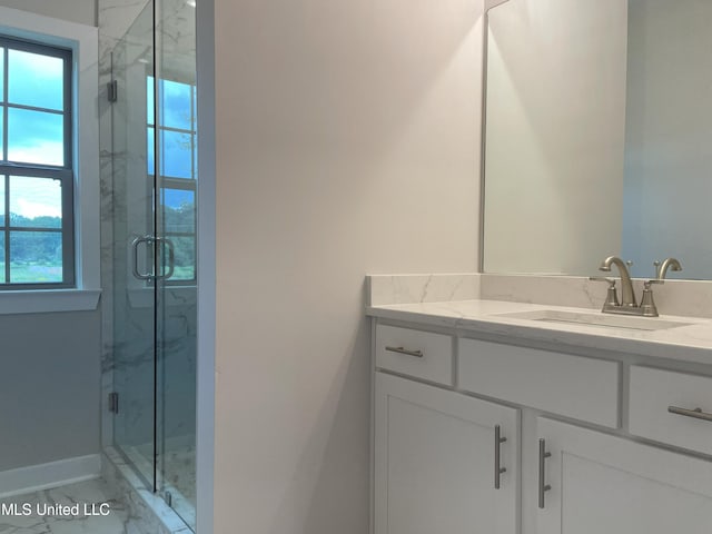 9092 Bennett Trl, Hernando, MS 38632 - bathroom featuring vanity, marble finish flooring, and a marble finish shower