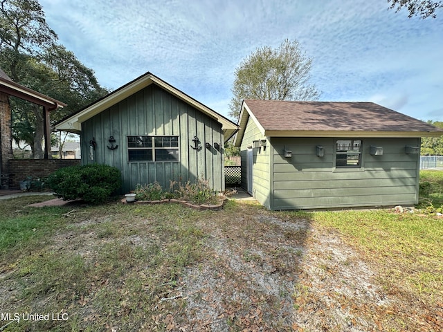 exterior space featuring an outbuilding