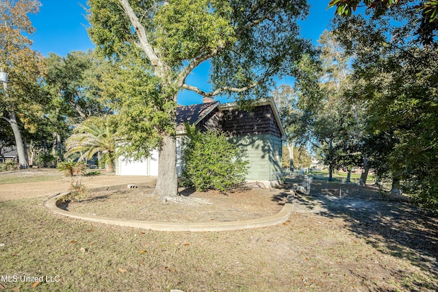 exterior space featuring a front yard