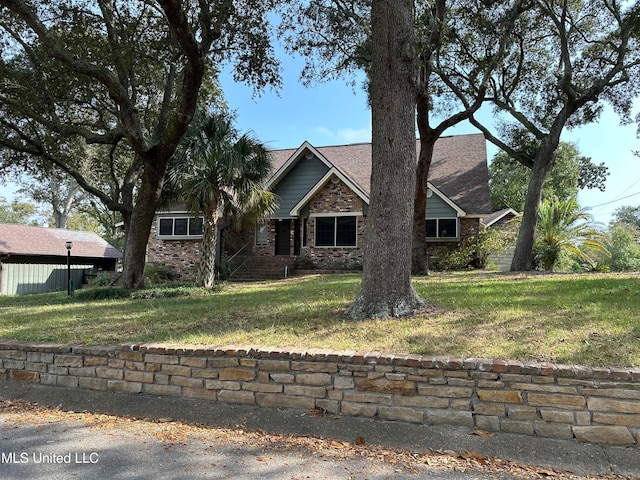 view of front of home with a front lawn