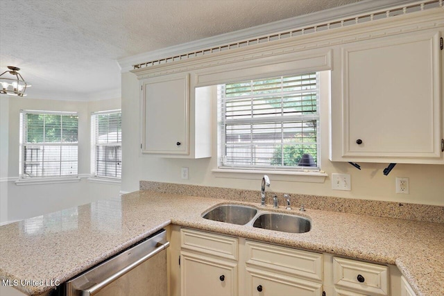 143 Glenwood Dr, Madison, MS 39110 - kitchen featuring stainless steel dishwasher, a textured ceiling, ornamental molding, a peninsula, and a chandelier