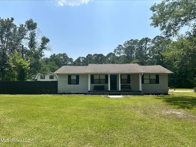 6400 Hans Rd, Moss Point, MS 39562 - ranch-style house with a porch and view of wooded area