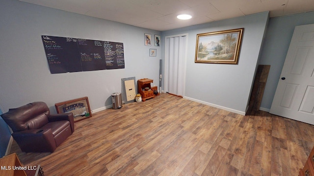 6400 Hans Rd, Moss Point, MS 39562 - sitting room with wood finished floors and baseboards