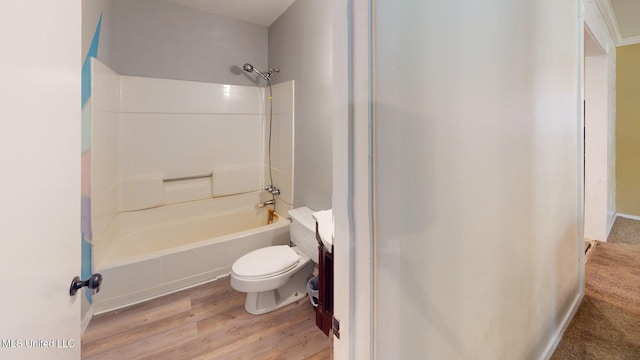 6400 Hans Rd, Moss Point, MS 39562 - bathroom featuring wood finished floors, toilet,  shower combination, and vanity