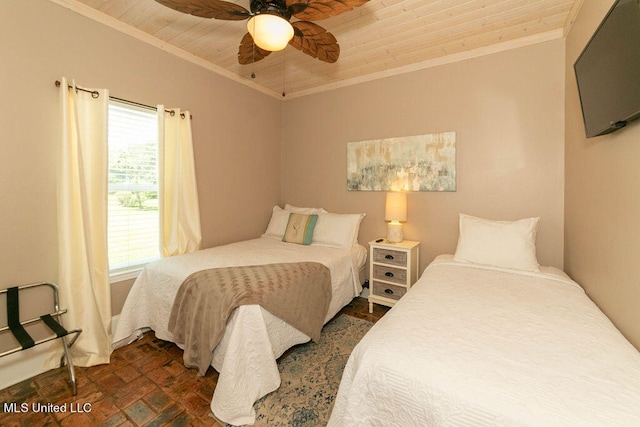 bedroom with crown molding, ceiling fan, and wooden ceiling