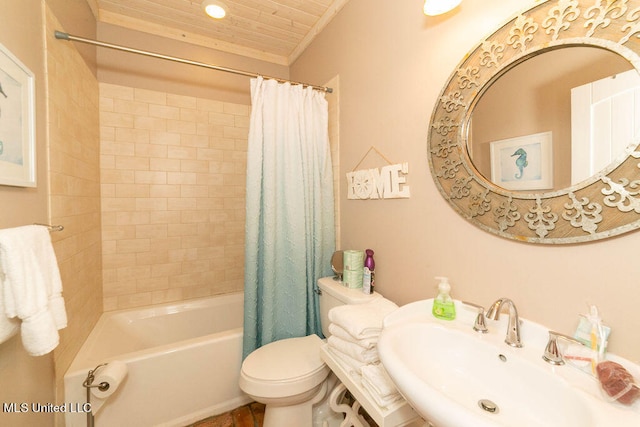 full bathroom with toilet, shower / bath combo with shower curtain, sink, and ornamental molding